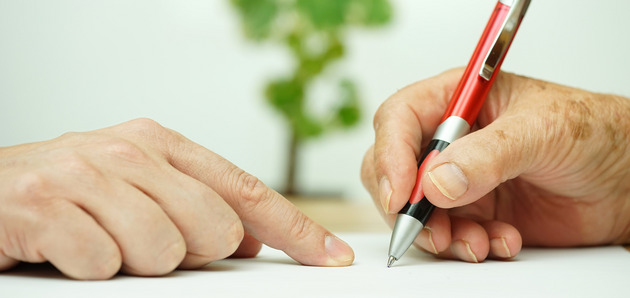 Hand und Stift